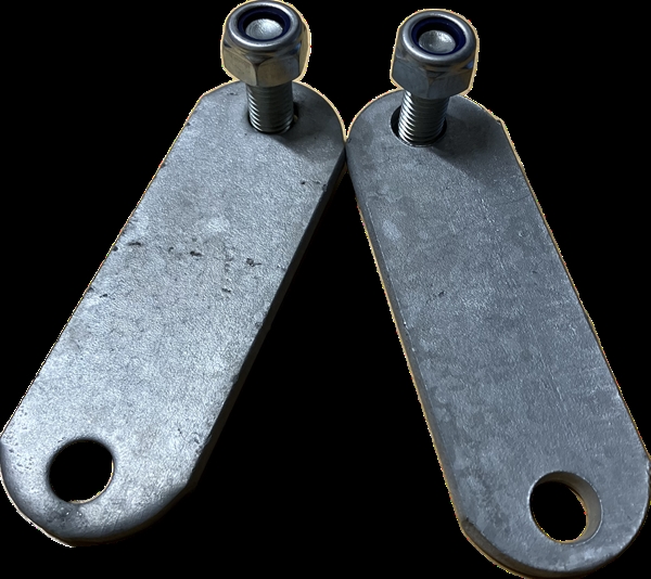 Beslag for skråinnstilling til fanggitre
